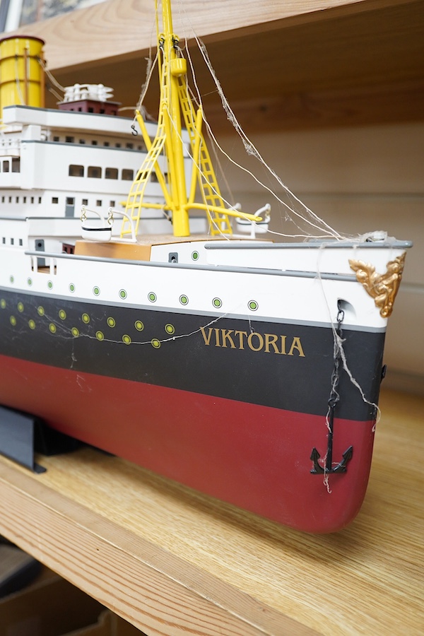 A modern Marklin clockwork tinplate ocean liner, 'Viktoria', on stand, hull 98cm long. Condition - fair, some losses and wear